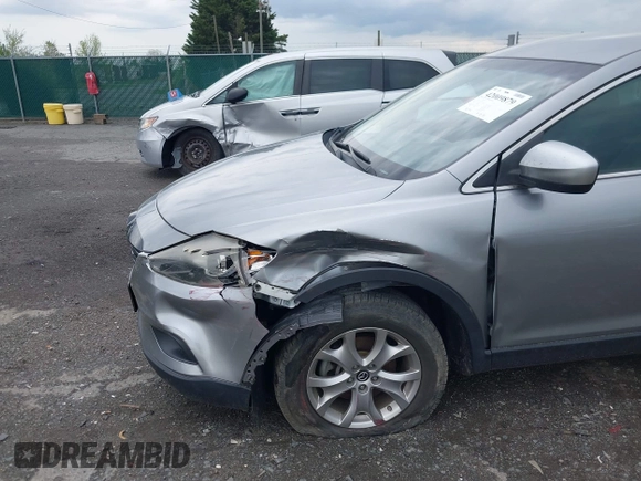 2015 Mazda CX-9 Sport with VIN JM3TB3BV2F0454770, listed as a IAAI auction lot 42009879 with 98,916 mi miles and . Bid and sale history available at carsss.com. Image 6.
