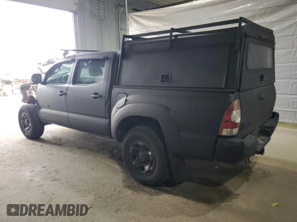 2009 Toyota Tacoma with VIN 3TMLU42N09M033351, listed as a Copart auction lot 48962095 with 184,289 mi miles and Salvage Title. Bid and sale history available at DreamBid. Image 2.