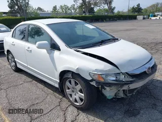 2009 Honda Civic LX z VIN 19XFA16599E015892, wystawiony jako IAAI lot #42111192 z przebiegiem 129 796 mil mil oraz . Historia ofert i sprzedaży dostępna na DreamBid. Obrazek 1.