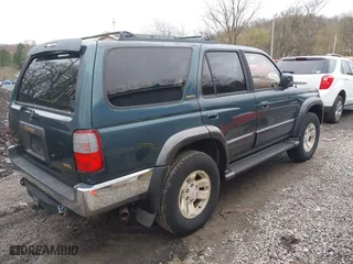 1997 Toyota 4Runner Limited with VIN JT3HN87R1V0078046, listed as a IAAI auction lot 42030550 with 163,683 mi miles. Bid and sale history available at carsss.com. Image 4.