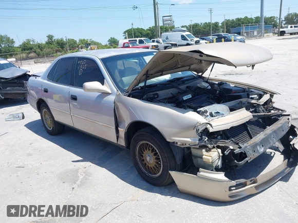 1995 Toyota Camry LE z VIN 4T1SK12E8SU872841, wystawiony jako IAAI lot #42025861 z przebiegiem 228 747 mil mil oraz . Historia ofert i sprzedaży dostępna na DreamBid. Obrazek 1.