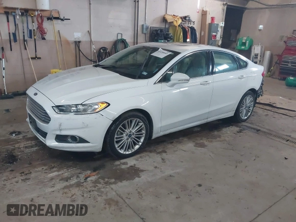 2016 Ford Fusion SE with VIN 3FA6P0T94GR268243, listed as a IAAI auction lot 41690685 with 63,327 mi miles. Bid and sale history available at carsss.com. Image 2.