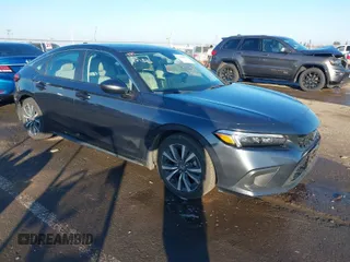 2023 Honda Civic EX-L with VIN 19XFL1H77PE012706, listed as a IAAI auction lot 41309072 with 20,914 mi miles and . Bid and sale history available at DreamBid. Image 1.
