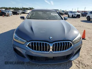 2022 BMW 8 Series M850i с VIN WBAGV8C06NCH25022, выставлен на аукционе Copart как лот 82894104 с пробегом 26 864 миль миль и На запчасти • Non repairable. История ставок и продаж доступна на DreamBid. Изображение 5.