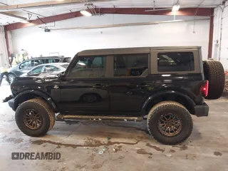 2022 Ford Bronco with VIN 1FMDE5DH0NLB06451, listed as a IAAI auction lot 42060509 with 55,624 mi miles and . Bid and sale history available at DreamBid. Image 14.