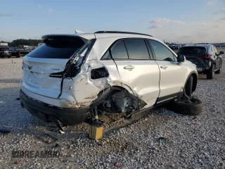 2022 Cadillac XT4 FWD Sport with VIN 1GYFZER48NF169913, listed as a Copart auction lot 84457034 with 36,406 mi miles and Clean title. Bid and sale history available at DreamBid. Image 3.