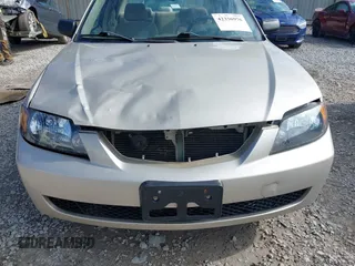 2001 Mazda Protege LX z VIN JM1BJ226210439446, wystawiony jako IAAI lot #42336976 z przebiegiem 155 990 mil mil oraz . Historia ofert i sprzedaży dostępna na DreamBid. Obrazek 6.