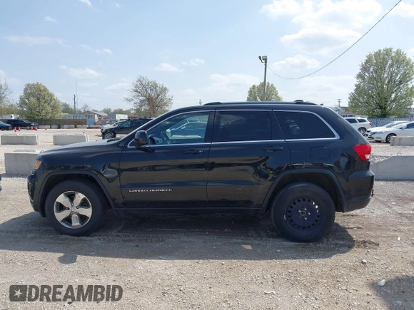 2014 Jeep Grand Cherokee Laredo with VIN 1C4RJFAG1EC315544, listed as a IAAI auction lot 42105987 with 164,430 mi miles. Bid and sale history available at carsss.com. Image 14.