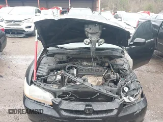 2002 Honda Accord LX with VIN 1HGCG56422A010978, listed as a IAAI auction lot 41639059 with 386,221 mi miles and . Bid and sale history available at DreamBid. Image 10.