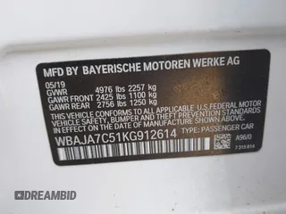 2019 BMW 5 Series 530i xDrive with VIN WBAJA7C51KG912614, listed as a IAAI auction lot 41516131 with 91,022 mi miles and . Bid and sale history available at DreamBid. Image 9.