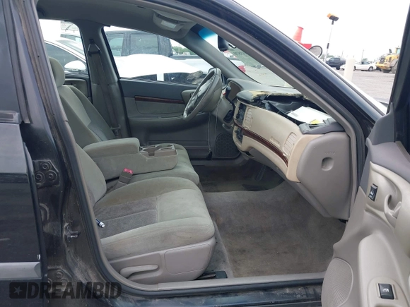 2004 Chevrolet Impala with VIN 2G1WF52E349136173, listed as a IAAI auction lot 42149870 with 165,215 mi miles. Bid and sale history available at carsss.com. Image 5.
