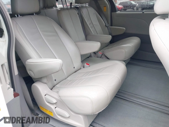 2014 Toyota Sienna XLE with VIN 5TDYK3DC2ES485846, listed as a IAAI auction lot 41693092 with 106,156 mi miles and . Bid and sale history available at DreamBid. Image 8.