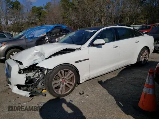 2017 Jaguar XJ with VIN SAJWJ2GD4H8W12163, listed as a Copart auction lot 86993064 with 63,697 mi miles and Salvage Title. Bid and sale history available at carsss.com. Image 1.