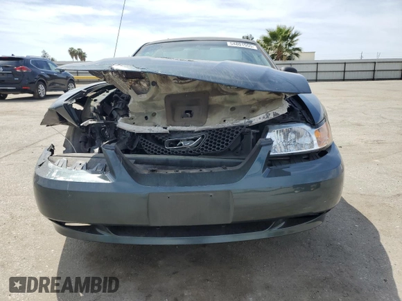 1999 Ford Mustang z VIN 1FAFP4041XF140264, wystawiony jako Copart lot #54801555 z przebiegiem 156 514 mil mil oraz Szkoda całkowita • Salvage title. Historia ofert i sprzedaży dostępna na DreamBid. Obrazek 5.