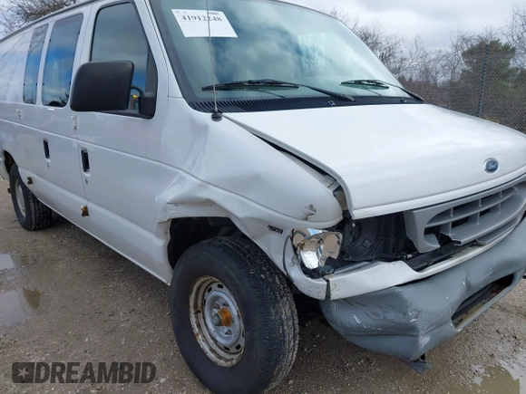 2000 Ford Econoline Cargo with VIN 1FTRE14W2YHB25933, listed as a IAAI auction lot 41912248 with 57,561 mi miles. Bid and sale history available at carsss.com. Image 6.