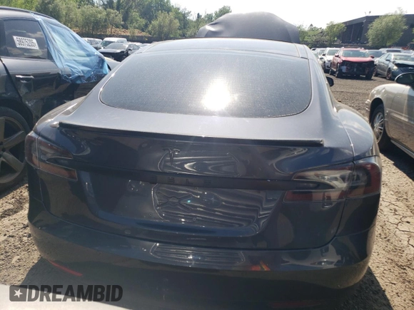 2016 Tesla Model S 90D with VIN 5YJSA1E42GF139758, listed as a Copart auction lot 63077255 with 78,235 mi miles and Salvage title. Bid and sale history available at DreamBid. Image 6.