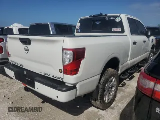 2024 Nissan Titan XD PRO-4X with VIN 1N6AA1FB4RN105718, listed as a Copart auction lot 74979434 with 14,813 mi miles and Non Repairable. Bid and sale history available at carsss.com. Image 3.