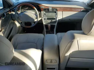 2003 Cadillac DeVille DTS z VIN 1G6KF57963U257494, wystawiony jako Copart lot #84532944 z przebiegiem 104 766 mil mil oraz Szkoda całkowita • Salvage title. Historia ofert i sprzedaży dostępna na DreamBid. Obrazek 8.