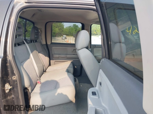 2007 Dodge Dakota SLT z VIN 1D7HW48K97S138512, wystawiony jako IAAI lot #42386042 z przebiegiem 146 629 mil mil oraz . Historia ofert i sprzedaży dostępna na DreamBid. Obrazek 8.
