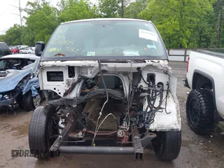 2014 Chevrolet Express Cargo with VIN 1GCWGFCA2E1198370, listed as a IAAI auction lot 42143804 with Not provided miles and . Bid and sale history available at DreamBid. Image 11.