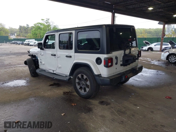 2018 Jeep Wrangler Unlimited Sahara with VIN 1C4HJXEG3JW116404, listed as a IAAI auction lot 42152506 with 57,727 mi miles and . Bid and sale history available at DreamBid. Image 3.