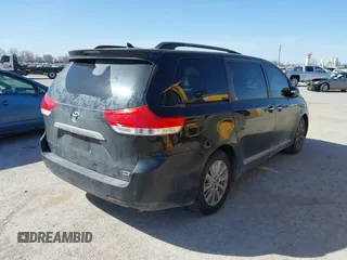 2013 Toyota Sienna XLE with VIN 5TDDK3DC8DS051928, listed as a IAAI auction lot 41857402 with 175,839 mi miles and . Bid and sale history available at DreamBid. Image 4.