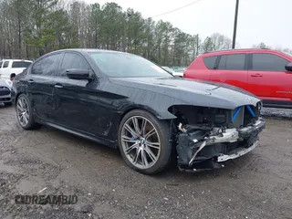 2018 BMW 5 Series M550i xDrive with VIN WBAJB9C59JB049114, listed as a IAAI auction lot 41543633 with 87,942 mi miles and . Bid and sale history available at carsss.com. Image 6.
