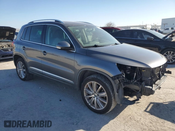 2012 Volkswagen Tiguan SE with VIN WVGAV7AX8CW080123, listed as a Copart auction lot 88922235 with 159,093 mi miles and Salvage Title. Bid and sale history available at DreamBid. Image 4.