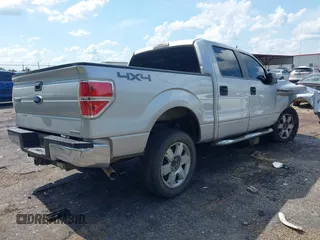 2014 Ford F-150 XL with VIN 1FTFW1EF9EKD53666, listed as a IAAI auction lot 42561185 with 239,511 mi miles and . Bid and sale history available at DreamBid. Image 4.
