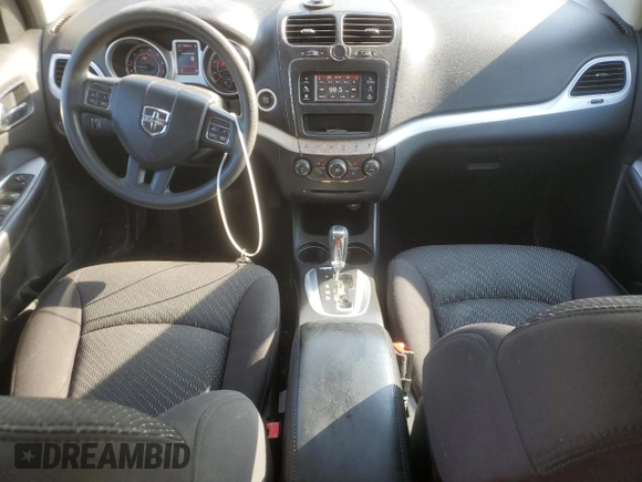 2013 Dodge Journey SXT with VIN 3C4PDCBG4DT619319, listed as a Copart auction lot 62964135 with 140,620 mi miles and Salvage title. Bid and sale history available at DreamBid. Image 8.