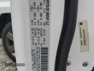 2014 Jeep Patriot Latitude z VIN 1C4NJPFA2ED928050, wystawiony jako Copart lot #50195295 z przebiegiem 130 437 mil mil oraz Szkoda całkowita • Salvage title. Historia ofert i sprzedaży dostępna na DreamBid. Obrazek 13.