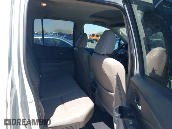 2019 Honda Ridgeline RTL-E with VIN 5FPYK3F74KB009279, listed as a IAAI auction lot 42348773 with 98,141 mi miles and . Bid and sale history available at DreamBid. Image 8.