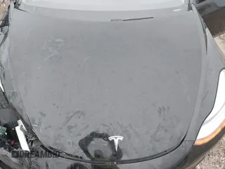 2018 Tesla Model 3 Long Range Battery with VIN 5YJ3E1EB1JF127289, listed as a IAAI auction lot 41484253 with 60,577 mi miles and . Bid and sale history available at DreamBid. Image 10.