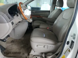 2010 Toyota Sienna XLE with VIN 5TDYK4CCXAS335064, listed as a Copart auction lot 62649665 with 246,327 mi miles and Salvage title. Bid and sale history available at DreamBid. Image 7.