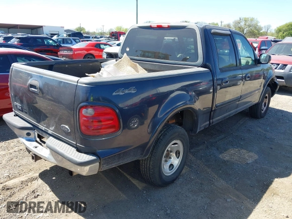 2001 Ford F-150 SuperCrew XLT with VIN 1FTRW08W81KF01853, listed as a IAAI auction lot 41850493 with 1 mi miles. Bid and sale history available at carsss.com. Image 4.
