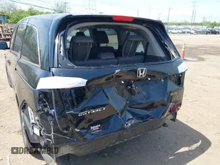2014 Honda Odyssey Touring with VIN 5FNRL5H94EB079518, listed as a IAAI auction lot 42095098 with 141,019 mi miles and . Bid and sale history available at DreamBid. Image 6.