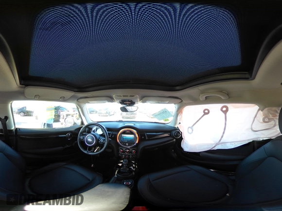 2019 MINI Hardtop Cooper with VIN WMWXP5C52K2H97728, listed as a IAAI auction lot 42026666 with 61,464 mi miles and . Bid and sale history available at DreamBid. Image 18.