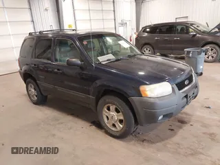 2004 Ford Escape XLT with VIN 1FMYU93134KB36712, listed as a IAAI auction lot 42412101 with 232,340 mi miles and . Bid and sale history available at DreamBid. Image 1.