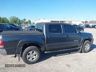 2009 Toyota Tacoma PreRunner with VIN 3TMJU62N59M088137, listed as a IAAI auction lot 41775410 with 217,331 mi miles. Bid and sale history available at carsss.com. Image 13.