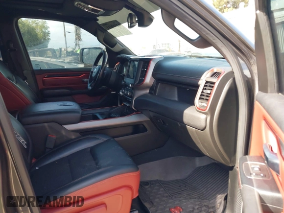 2019 Ram 1500 Rebel z VIN 1C6SRFLT2KN696557, wystawiony jako IAAI lot #42110931 z przebiegiem 81 372 mil mil oraz . Historia ofert i sprzedaży dostępna na DreamBid. Obrazek 5.