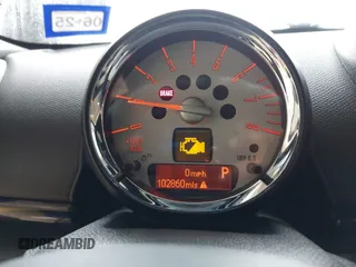 2014 MINI Countryman S z VIN WMWZC5C59EWP36617, wystawiony jako IAAI lot #41550024 z przebiegiem 102 860 mil mil oraz . Historia ofert i sprzedaży dostępna na DreamBid. Obrazek 7.