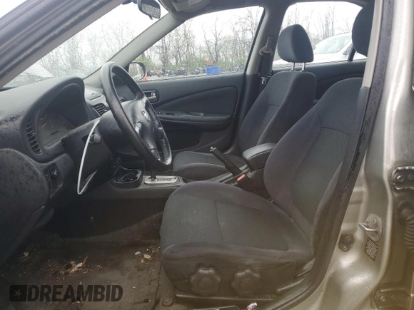 2006 Nissan Sentra S with VIN 3N1CB51D46L642824, listed as a Copart auction lot 50992655 with 157,462 mi miles and Salvage Title. Bid and sale history available at DreamBid. Image 7.
