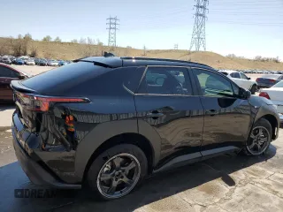 2024 Subaru Solterra Premium z VIN JTMABABA9RA064491, wystawiony jako Copart lot #52993485 z przebiegiem 9079 mil mil oraz Szkody całkowita. Historia ofert i sprzedaży dostępna na DreamBid. Obrazek 3.