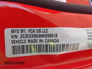 2022 Dodge Charger SXT with VIN 2C3CDXBG8NH208316, listed as a IAAI auction lot 42099897 with 47,596 mi miles and . Bid and sale history available at carsss.com. Image 9.