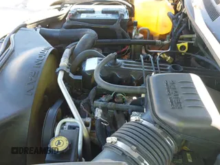 2003 Jeep Grand Cherokee Laredo with VIN 1J4GX48S63C564756, listed as a IAAI auction lot 43470178 with 234,590 mi miles and . Bid and sale history available at DreamBid. Image 12.