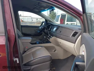 2017 Kia Sedona LX with VIN KNDMB5C14H6339494, listed as a IAAI auction lot 41819289 with NaN miles. Bid and sale history available at carsss.com. Image 5.
