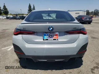 2024 BMW i4 eDrive35 with VIN WBY43AW06RFS94891, listed as a Copart auction lot 57983274 with 1,099 mi miles and Salvage Title. Bid and sale history available at carsss.com. Image 6.