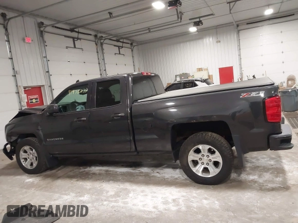 2016 Chevrolet Silverado 1500 LT with VIN 1GCVKREC0GZ303387, listed as a IAAI auction lot 41978237 with 123,692 mi miles and . Bid and sale history available at DreamBid. Image 14.