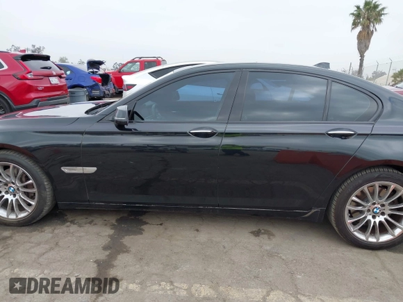 2015 BMW 7 Series 740i with VIN WBAYA6C54FG273188, listed as a IAAI auction lot 42563572 with 70,675 mi miles and . Bid and sale history available at DreamBid. Image 15.