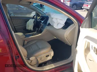 2014 Ford Taurus SEL with VIN 1FAHP2E80EG159131, listed as a IAAI auction lot 42004296 with 140,213 mi miles and . Bid and sale history available at DreamBid. Image 5.